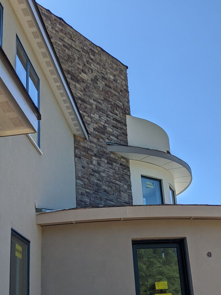 cultured stone and stucco contemporary custom home